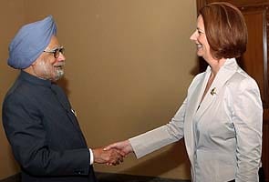 PM, Julia Gillard meet in Bali, discuss uranium sale