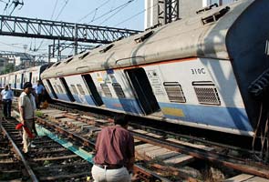 Coach of local train in Mumbai flips over