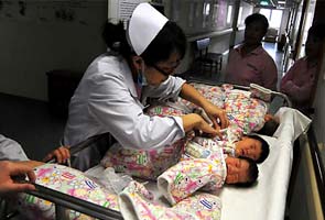 Chinese couple with eight test tube babies faces hefty fines