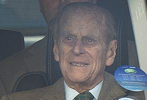 Britain's Prince Philip leaves hospital after undergoing heart treatment