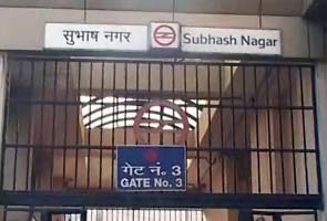 Woman dies after leaping onto track at Delhi metro station