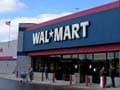 Wal-Mart to pay for medical costs in syringe case