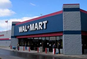 Wal-Mart to pay for medical costs in syringe case    