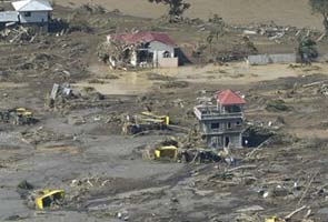 Mass burial for 700 flood victims in Philippines