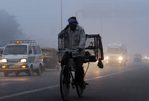 Capital shivers: Thick fog disrupts air, rail traffic