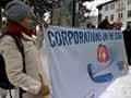 Corporations on the leash protesters campaign in Davos