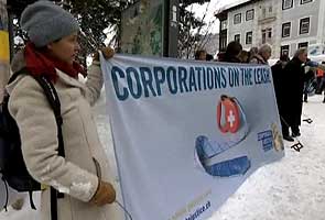 Corporations on the leash protesters campaign in Davos