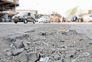 Mumbai civic body grants 8 crore to fix potholes