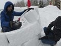 Occupy Wall Steet protesters build igloos in Switzerland to protest economic summit