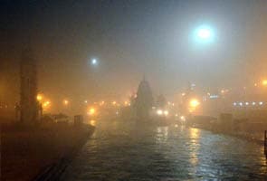 Fog, rain disrupt life in north India