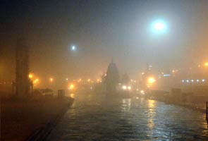 Fog, rain disrupt life in north India