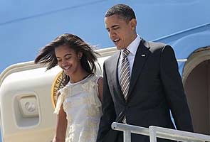 'Obama's daughters find him embarrassing'