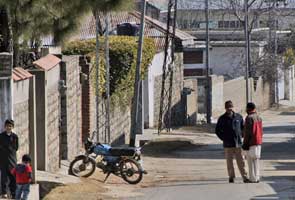 In bin Laden town, father mourns another militant