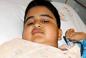 Tumour behind 7-year-old's weight gain, moustache