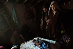 In grip of cold, Afghan family buries eighth child