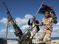 A year after uprising, militias hold sway in Libya