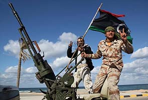 A year after uprising, militias hold sway in Libya