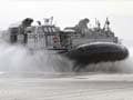 Marines practice amphibious war, storm US beaches