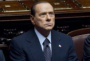 Berlusconi challenges judges in bribery case