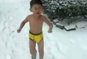 Storm over video of boy made to run naked through New York snow