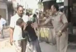 Cops beating teen caught on camera in Andhra Pradesh