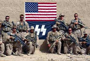 Marines posed with logo resembling Nazi symbol