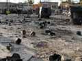 Syria says suicide bombers kill 28 in Aleppo