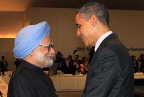 Barack Obama greets Manmohan Singh with hug at Seoul meet