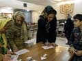 Iran elections: Ahmadinejad rivals leading in parliament vote
