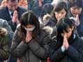 Japan falls silent for tsunami victims