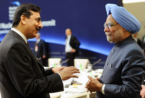 PM, Gilani greet each other at Seoul summit