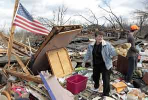 Tornadoes demolish small towns across US, 38 dead