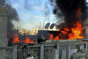 Syrian forces shell rebels, Red Cross kept waiting Syrian forces shell rebels, Red Cross kept waiting