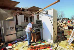31 dead, town 'gone' as tornados rage across US