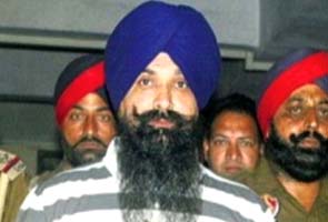 Sikh hardliner, aide walk free after High Court bail