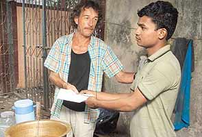 Marathon winner donates prize money to tea stall worker