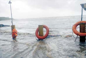 Romancing couple saved from high tide