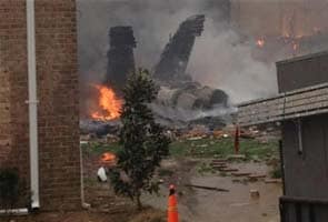 US Navy jet crashes into apartment building in Virginia