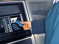 Senior rescued after fingers were tapped in ATM machine