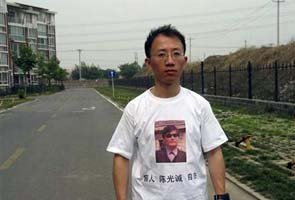 Home surrounded after blind China activist's mystery "escape"