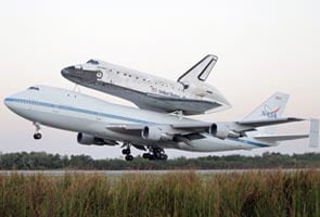 Space shuttle Discovery lands at new museum home 