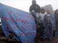 Six men climb into volcano in job loss protest
