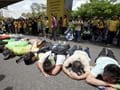 Tear gas used as 25,000 rally for reforms in Malaysia
