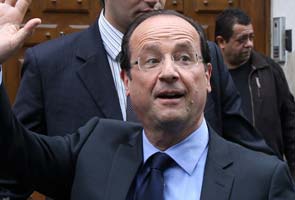 New French President Francois Hollande says he is worth less than Nicolas Sarkozy