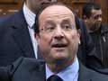 New French President Francois Hollande says he is worth less than Nicolas Sarkozy