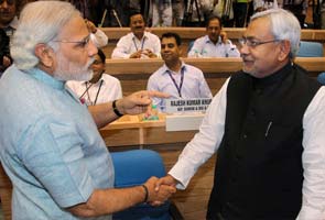 Controversy over Nitish handshake with Modi