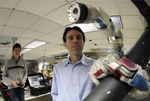 Tool-wielding robots crawl in bodies for surgery