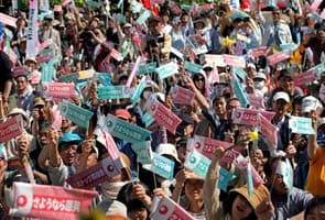 Thousands march as Japan shuts off nuclear power