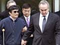 Chinese activist who fled house arrest lands in US