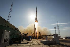 Three-man Soyuz crew departs for space station